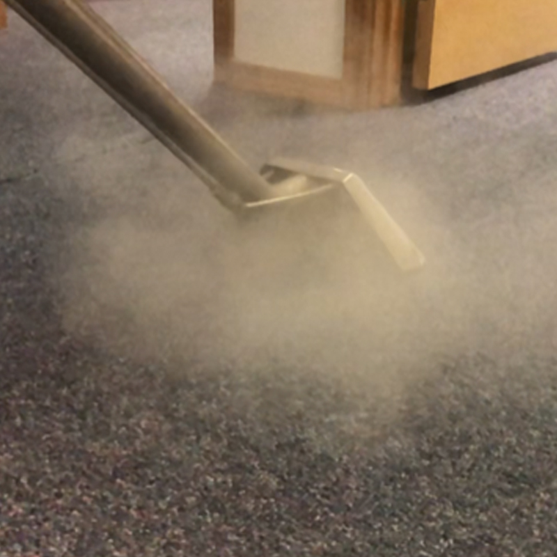 Carpet Cleaning vacuum head vacuums dirt from floor 
